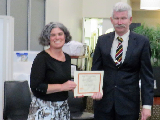Glen Sullivan receives his award from President Heather Davey Glen Sullivan receives his award from President Heather Davey